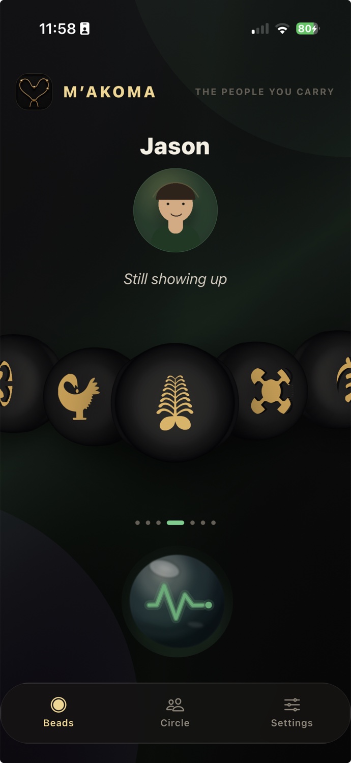 M'AKOMA app on a phone